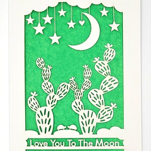 Love you to the Moon, Wüstenszene mit Kaktus, Sternen, dem Mond, einem verliebten Paar Schildkröten - Laser Cut Grußkarte