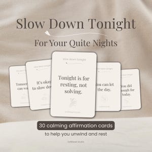 May include: A set of 30 calming affirmation cards with the text "Slow Down Tonight" and "For Your Quite Nights". The cards are white with black text, designed to help you unwind and rest. The cards have phrases like "Tonight is for resting, not solving."