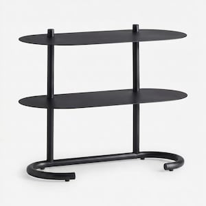 May include: A matte black metal shelving unit featuring two oval-shaped shelves supported by two vertical poles. The base consists of a curved, U-shaped tubular frame that provides stability, creating a clean and functional storage structure.