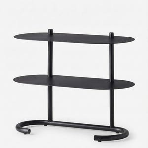 May include: A matte black metal shelving unit featuring two oval-shaped shelves supported by two vertical cylindrical posts. The base consists of a curved, U-shaped tubular frame that provides stability, creating a clean and functional storage structure.