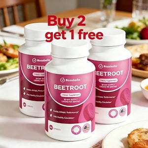 May include: Three white Rosabella Beetroot dietary supplement bottles with pink labels. The labels include text such as "30 Day Supply" and "1300mg per serving". The bottles are on a white surface with food in the background. The text "Buy 2 get 1 free" is at the top.