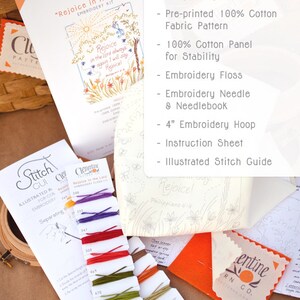 May include: A cross-stitch embroidery kit with a pre-printed 100% cotton fabric pattern, embroidery floss, needle, needlebook, 4-inch embroidery hoop, instruction sheet, and illustrated stitch guide. The kit includes a design that says "Rejoice in the Lord" with a colorful floral design.