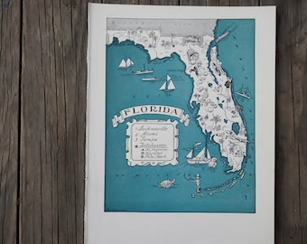 May include: Vintage map of Florida with teal and white illustrations. The map features sailboats, palm trees, and the names of cities like Jacksonville, Miami, and Tampa. The word "Florida" is displayed in a banner.