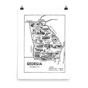 May include: A black and white line drawing of the state of Georgia, with various agricultural products and natural resources depicted within its borders. The text "GEORGIA" is at the bottom of the map, along with the area and population of the state.