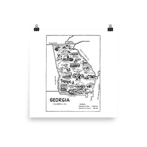 May include: A black and white line drawing of the state of Georgia, with various icons representing the state's features, such as peaches, cotton, and the state capitol building. The text "GEORGIA" is printed below the map, along with the state's area and population information.