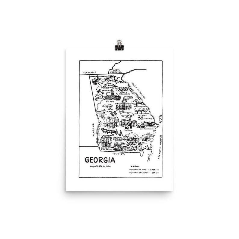 May include: A black and white line drawing map of the state of Georgia. The map is filled with illustrations of various industries and agricultural products found in the state, such as cotton, peaches, and lumber. The map also includes the state's capital city, Atlanta, and the surrounding states.