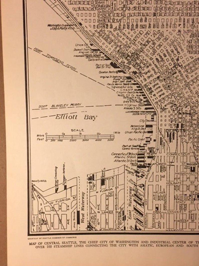 May include: A black and white map of central Seattle, Washington, showing the city's waterfront and surrounding areas. The map includes the text "Elliott Bay" and "Map of Central Seattle, the Chief City of Washington and Industrial Center of the Pacific Northwest. Over 100 Steamship Lines Connecting the City with Asiatic, European and South American Ports."