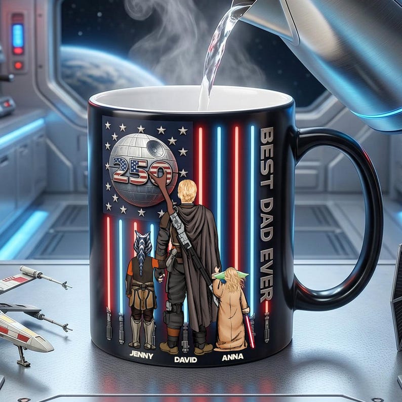 May include: Black ceramic mug with a Star Wars theme. The mug features the text "BEST DAD EVER" and a graphic of characters. The design includes red and blue vertical lines, a Death Star, and the number "250".