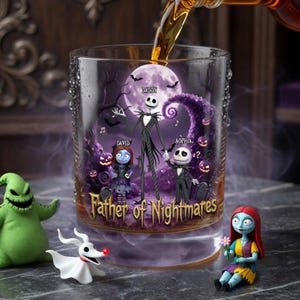 May include: A clear glass tumbler with a spooky design featuring Jack Skellington and other characters from The Nightmare Before Christmas. The words "Father of Nightmares" are printed on the glass. A liquid is being poured into the glass.