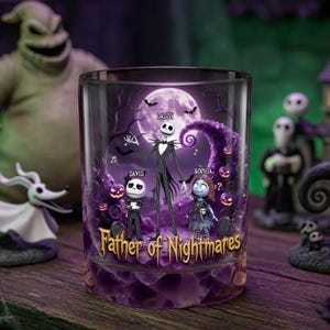 May include: A clear glass featuring a scene from The Nightmare Before Christmas. The design includes Jack Skellington, Sally, and other characters, with the text "Father of Nightmares". The background has a purple and black color scheme.