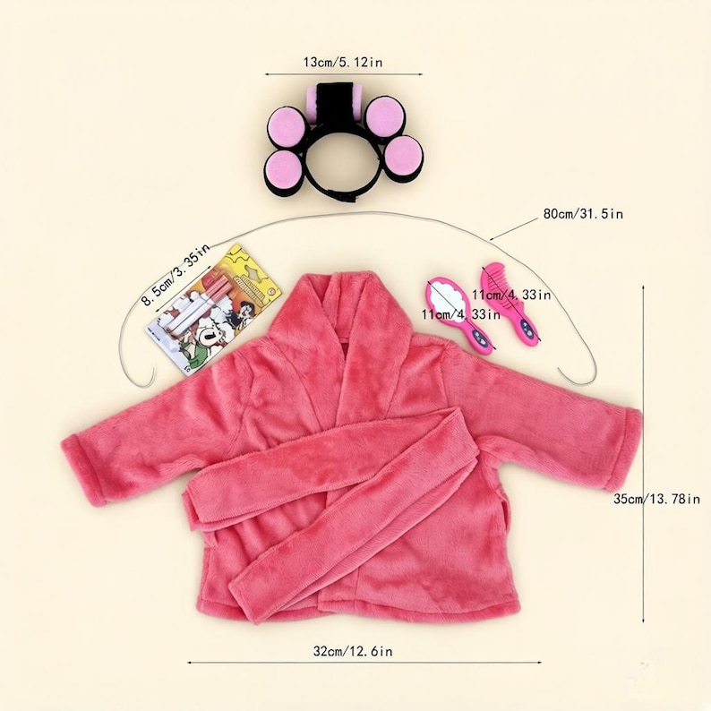 May include: A pink plush bathrobe with a matching belt, a black headband with five pink rollers, a small rectangular card with cartoon graphics, and two small pink plastic hair tools. Dimensions are marked as 13cm/5.12in, 8.5cm/3.35in, 11cm/4.33in, 80cm/31.5in, 35cm/13.78in, and 32cm/12.6in.