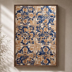 May include: A rectangular wall art piece featuring a grid of twelve square tiles framed in dark wood. Each tile displays a repeating pattern of intricate, swirling floral motifs in deep blue and warm tan colors against a cream background.