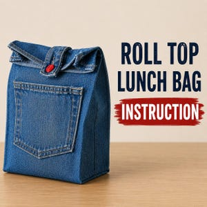 May include: A blue denim roll top lunch bag featuring a front pocket and a single red button closure. The text ROLL TOP LUNCH BAG INSTRUCTION is printed in dark blue and red on the right side of the bag against a light background.