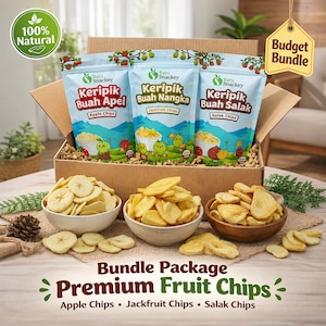May include: A cardboard box containing three pouches of Batu Snackey fruit chips labelled Keripik Buah Apel, Keripik Buah Nangka, and Keripik Buah Salak. Three bowls filled with apple, jackfruit, and salak chips sit in front of the box with text below.