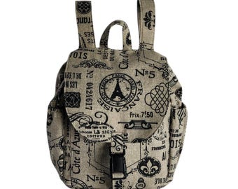 Backpack Paris theme on a tan canvas Medium