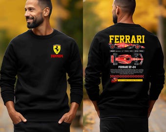 May include: Black sweatshirt featuring the Ferrari logo on the front and a graphic of the Ferrari SF-24 race car on the back. The back design includes the word "FERRARI" in yellow and red, along with technical details.