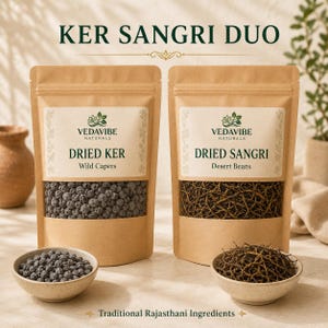 May include: Two brown paper pouches labelled KER SANGRI DUO, VEDAVIBE NATURALS, DRIED KER Wild Capers, and DRIED SANGRI Desert Beans. The pouches contain small dark grey round capers and thin brown bean strands, with matching bowls in front.