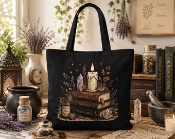 Bolso de mano con temática de brujas y libros, con luz de vela.