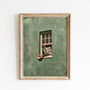 May include: A framed wall art print featuring a textured sage green wall with a single window. A person sits on the window ledge, legs extended outward, reading a newspaper. The scene is rendered with visible brushstrokes, creating a painterly effect.