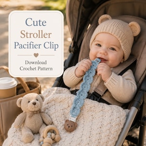 May include: A light blue crocheted dummy clip featuring a brown bear-shaped clasp. The text in the image reads: Cute Stroller Pacifier Clip, Download Crochet Pattern. The clip is held by a child wearing a beige knit hat with bear ears.