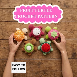 May include: Five small crocheted turtles with shells resembling fruit slices, including orange, dragon fruit, strawberry, kiwi, and watermelon designs. The text FRUIT TURTLE CROCHET PATTERN appears at the top, and EASY TO FOLLOW is at the bottom.