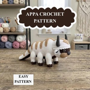 May include: A handmade crochet plush toy resembling a six-legged creature with white and tan fur, dark brown horns, and a brown nose. The text APPA CROCHET PATTERN is displayed in a dark brown cloud shape, and the text EASY PATTERN appears below.