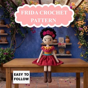 May include: A crochet doll with black hair adorned with pink flowers, wearing a colourful yellow and orange top with a red skirt and brown boots. The text FRIDA CROCHET PATTERN and EASY TO FOLLOW are displayed on the image in white and black.