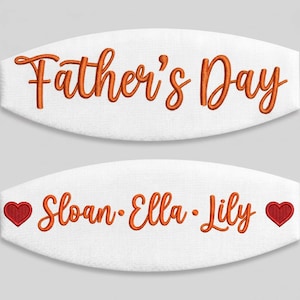 May include: Two white fabric face masks with orange embroidered text. The top mask features the words Father's Day. The bottom mask displays the names Sloan, Ella, and Lily separated by orange dots, flanked by two red embroidered heart icons.