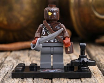 MOC – Piraci z Karaibów – figurka Murtogga | Żołnierz Royal Navy Disneya | Komiksowa figurka Straży Portowej | Rzadka figurka kolekcjonerska