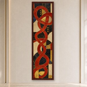 May include: A tall, rectangular framed wall art piece featuring a prominent, continuous red ribbon-like form that twists vertically through the center. The background consists of geometric panels in black, gold, and cream with varied textures.