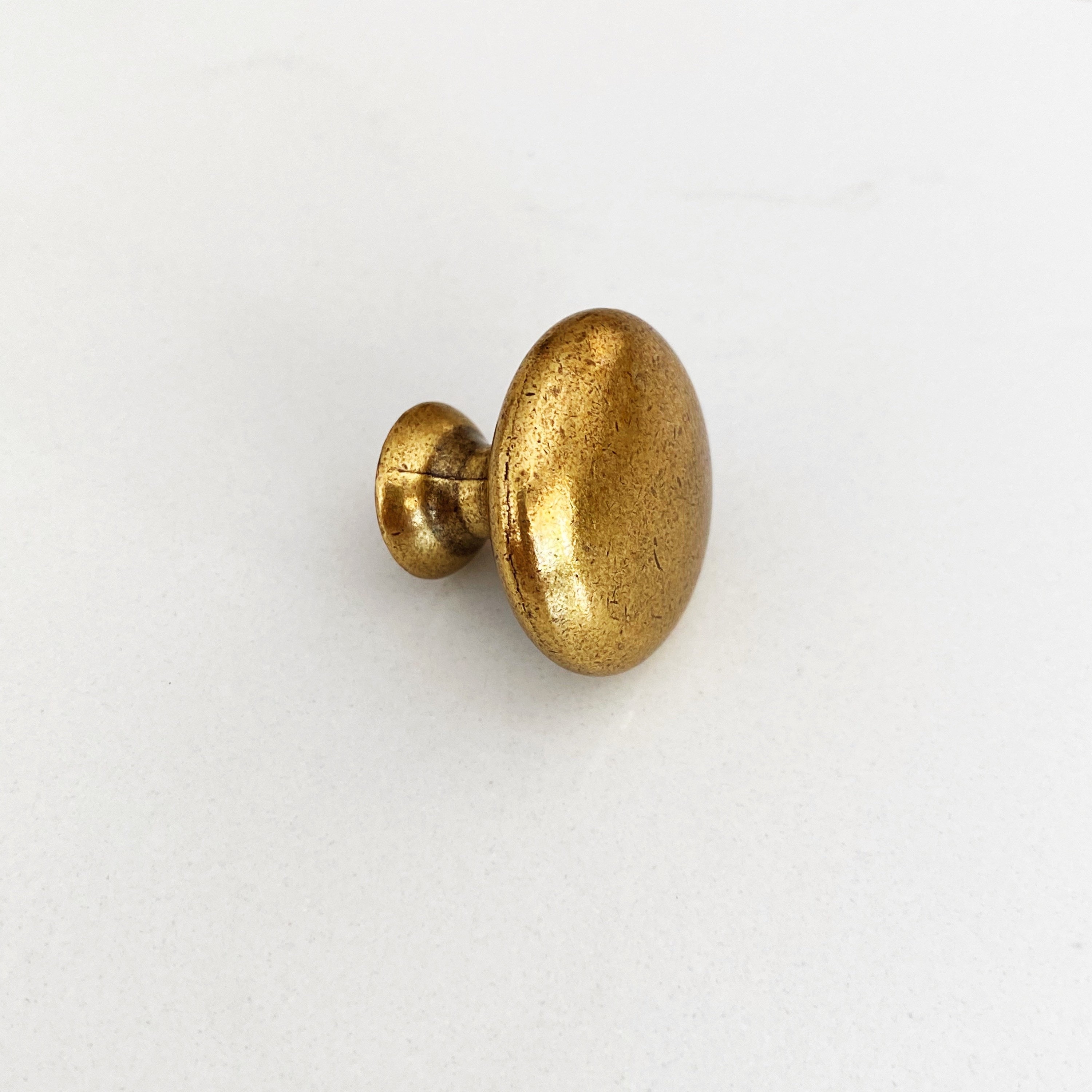 Round Drawer Knob capri in Antique Brass Brass Cabinet Hardware