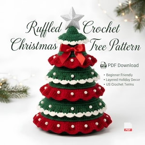 May include: A crocheted Christmas tree with layered green and red ruffled tiers, white scalloped edges, and white pearl accents. A silver star sits on top, and a red satin bow is tied near the peak. Text reads: Ruffled Crochet Christmas Tree Pattern, PDF Download, Beginner Friendly, Layered Holiday Decor, US Crochet Terms.