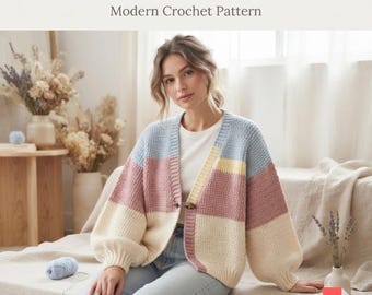 Puede incluir: Un cárdigan de ganchillo con un patrón de bloques de color pastel en azul claro, rosa empolvado y crema. La prenda tiene mangas largas, una tapeta frontal acanalada y un cierre de un solo botón. Texto: PASTEL COLOR-BLOCK CARDIGAN Modern Crochet Pattern.