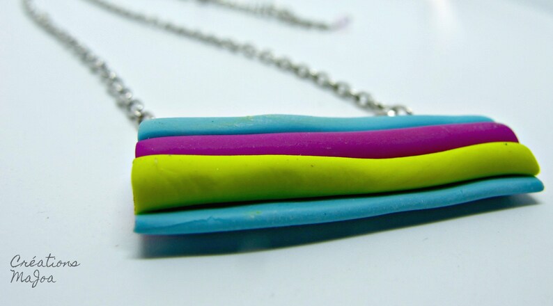 Collier /'/'r\u00e9glisse/'/' en p\u00e2te polym\u00e8re Licorice necklace made of polymer clay