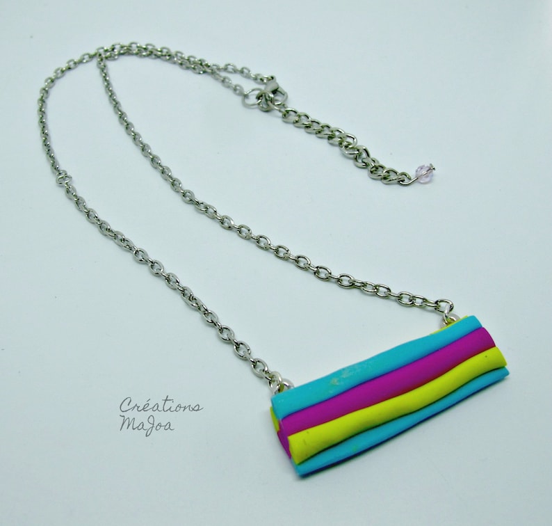 Collier /'/'r\u00e9glisse/'/' en p\u00e2te polym\u00e8re Licorice necklace made of polymer clay