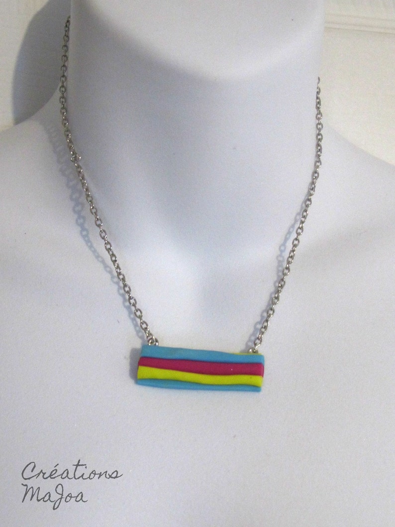 Collier /'/'r\u00e9glisse/'/' en p\u00e2te polym\u00e8re Licorice necklace made of polymer clay