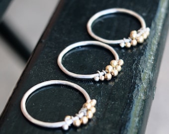 anello con pallini d'oro