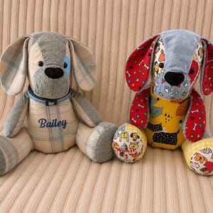 May include: Two plush dog toys sitting side by side. The left dog is made of beige and grey plaid fabric with the name Bailey embroidered in blue. The right dog features a colourful patchwork design with red, yellow, and blue patterns of dogs.