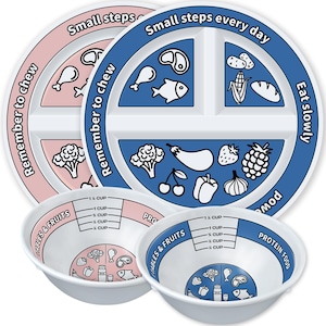 May include: Two divided plates and two bowls in pink and blue. The plates feature the text Small steps every day, Remember to chew, and Eat slowly, with food illustrations. The bowls include measurement markings up to 1 1/2 cups and labels.