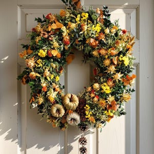 Autumn wreath with mixed leaves, Autumn wreath of eucalyptus, ruscus, autumn flowers, pumpkin, pinecones Modern rustic-style door decoration