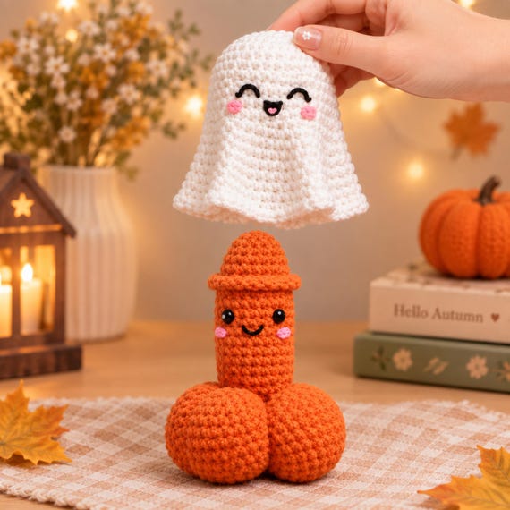 A hand-crocheted pumpkin that unzips or opens to reveal a ghost inside — genuinely handmade amigurumi with a surprise reveal mechanic that makes it a conversation piece.