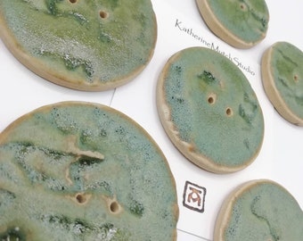 Ceramic button with textured imprint.  Various size options. Green