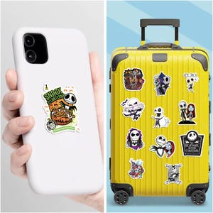 May include: A white smartphone case featuring a sticker with the text 'SNACK O'LANTERNS' and a yellow suitcase decorated with multiple stickers depicting characters from The Nightmare Before Christmas, including Jack Skellington and Sally.