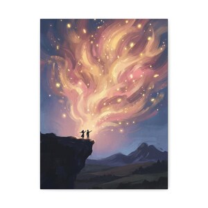 May include: A canvas print depicts two silhouetted figures standing on a cliff, arms outstretched, gazing at a vibrant, swirling cloud of pink, orange, and yellow light. The background features a dark blue sky and distant mountains.