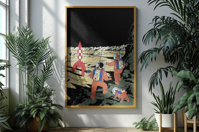 May include: A framed print featuring a retro-style illustration of astronauts exploring a lunar landscape. The artwork depicts two astronauts in orange suits, a red and white rocket, and a space dog. The background is a starry night sky.