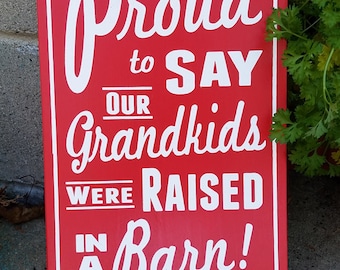 Proud to say our Grandkids were Raised in a Barn Wood Sign