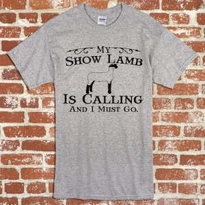 Lamm zu zeigen, Sie meine Show Lamm Unisex Erwachsene und Jugend Tshirt anruft