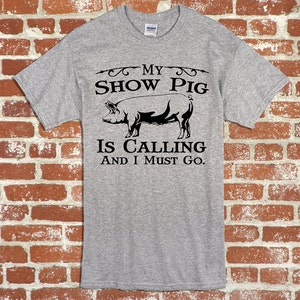 Show Pig My Show Pig Is Calling Unisex Adult and Youth Tshirt