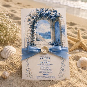 May include: Wedding invitation featuring a watercolor illustration of a blue door and archway overlooking the sea. The invitation includes the names "PETER and MARY" and the date "20.07.2025". A blue ribbon and seashell embellish the card, set on a sandy beach.