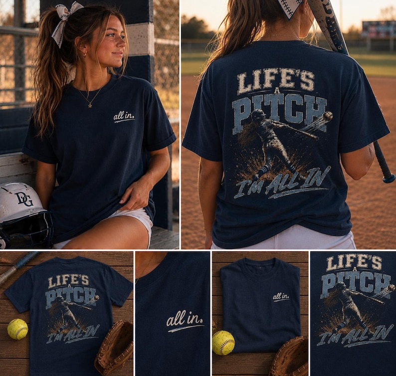 Pode incluir: Uma t-shirt azul-marinho de manga curta com o texto "all in." no peito esquerdo. As costas exibem um gr&aacute;fico de uma jogadora de softbol a bater com o texto "LIFE'S A PITCH" e "I'M ALL IN" num estilo vintage com aspeto desgastado.